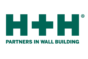 Vi Bygger Vejle: H+H logo med teksten 'PARTNERS IN WALL BUILDING'.